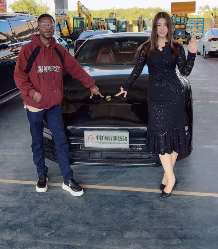 Two business partners discussing global trade and logistics between Africa and China