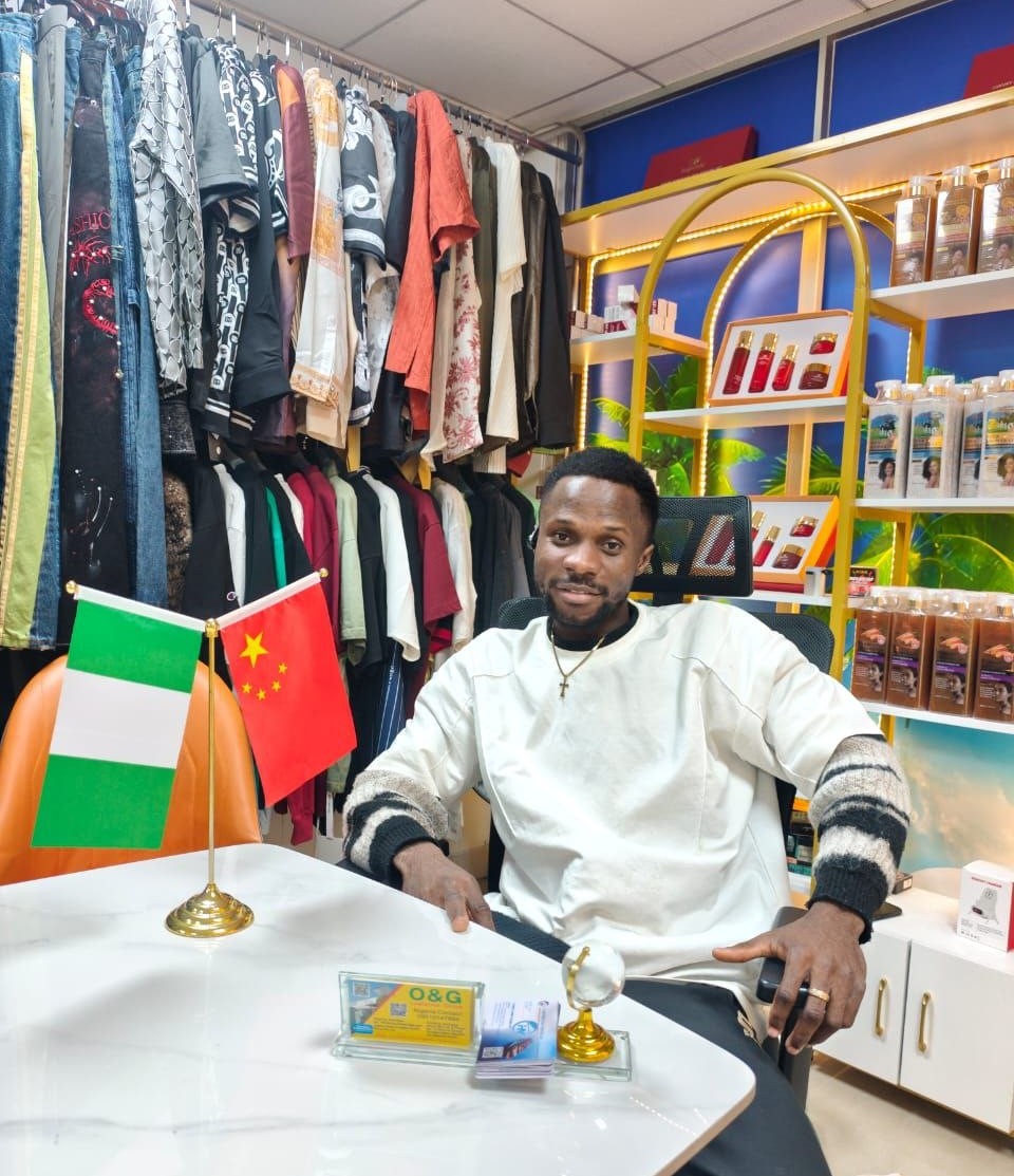 CEO of Kpojom International in a professional office environment