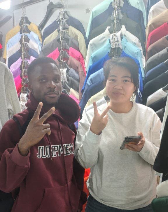 Quality control inspector checking goods at a China warehouse before shipping